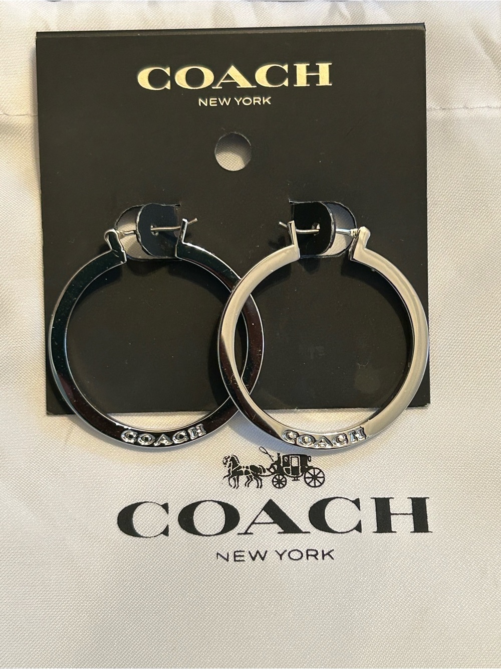 NWT Coach Silver Earrings - Comes with duster bag